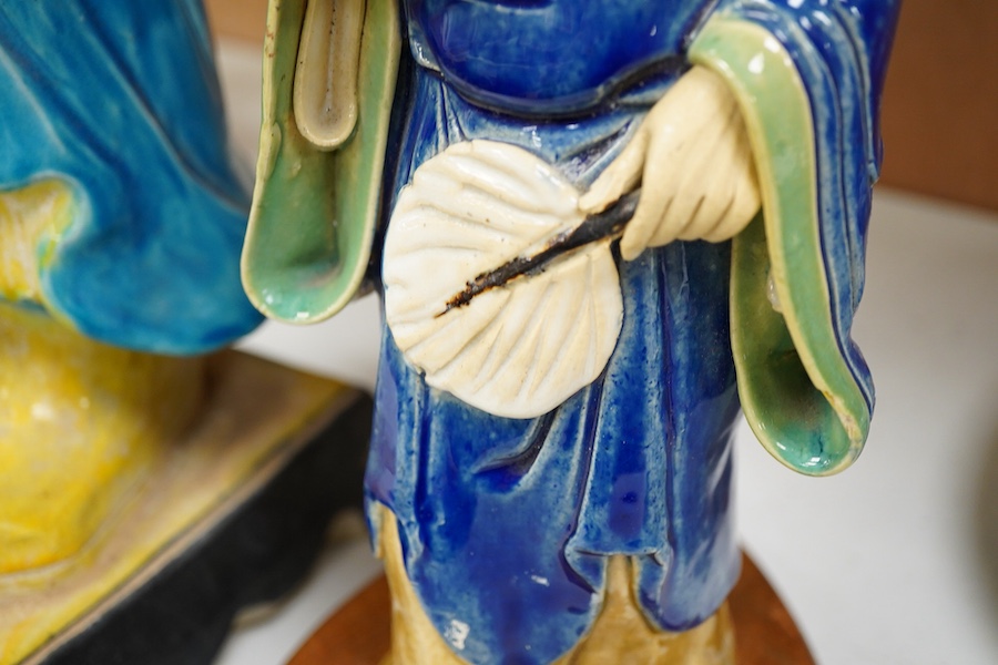 Two Chinese pottery glazed figures to include a Shiwan mudman, largest 48cm high